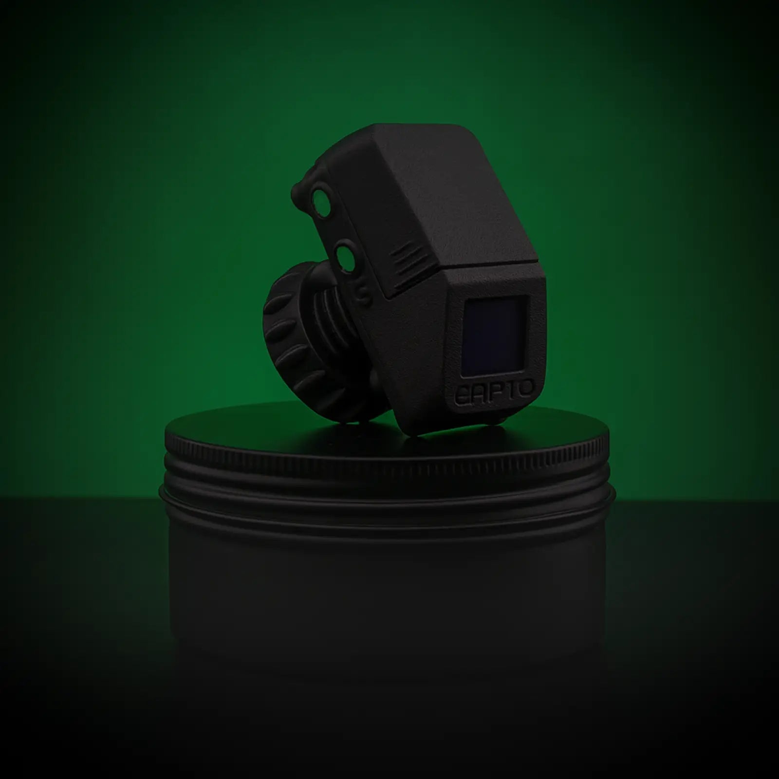 The new Capto Gen 3 Base Device sat on its round box angled down against a dark green background.